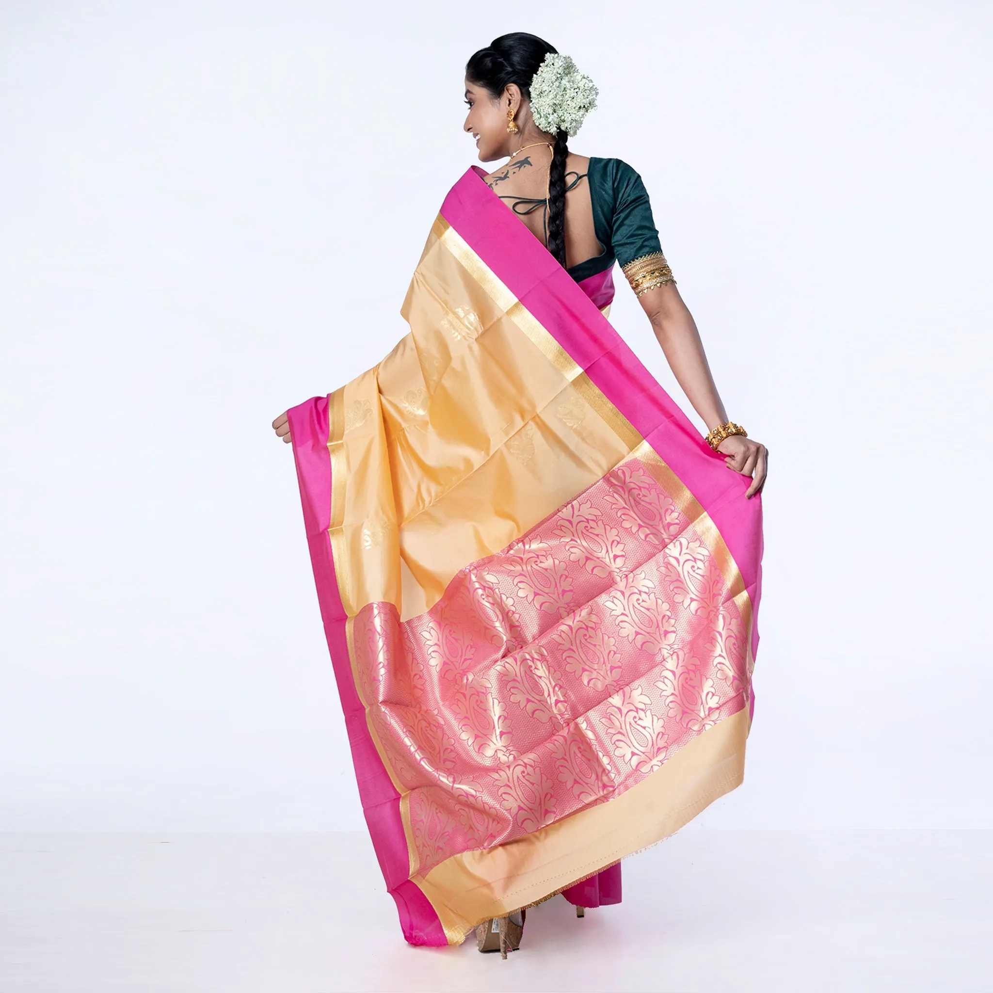 Women Kanjivaram Saree In Beige Color With Contravention Border And Zari Motifs