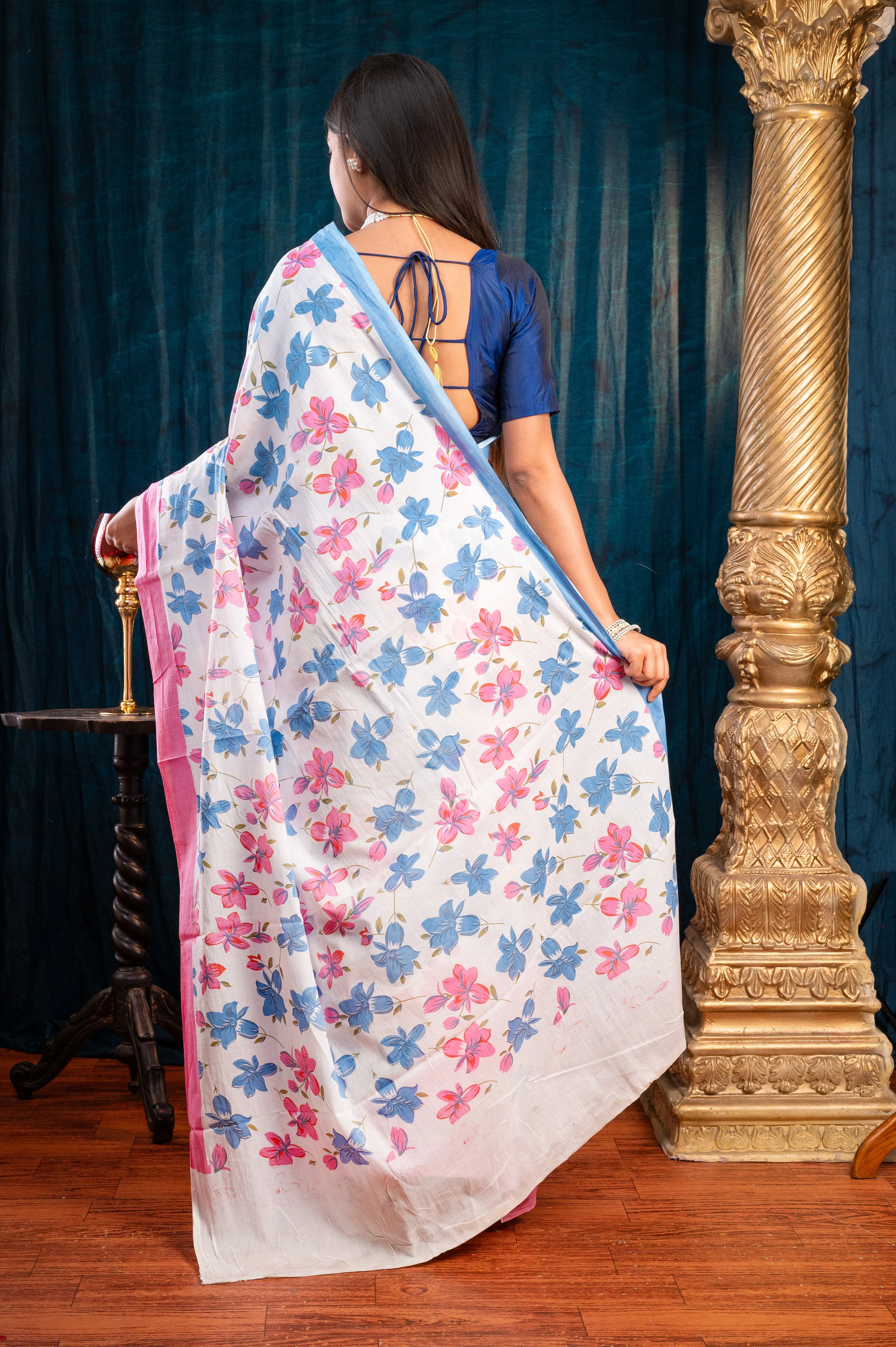 Women Off-White Pure Bagru Malmal Cotton Saree With Pink And Blue Flower Print